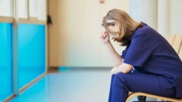 Nurse looking distressed