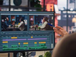 Man editing video on computer